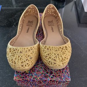gold flat jelly shoes